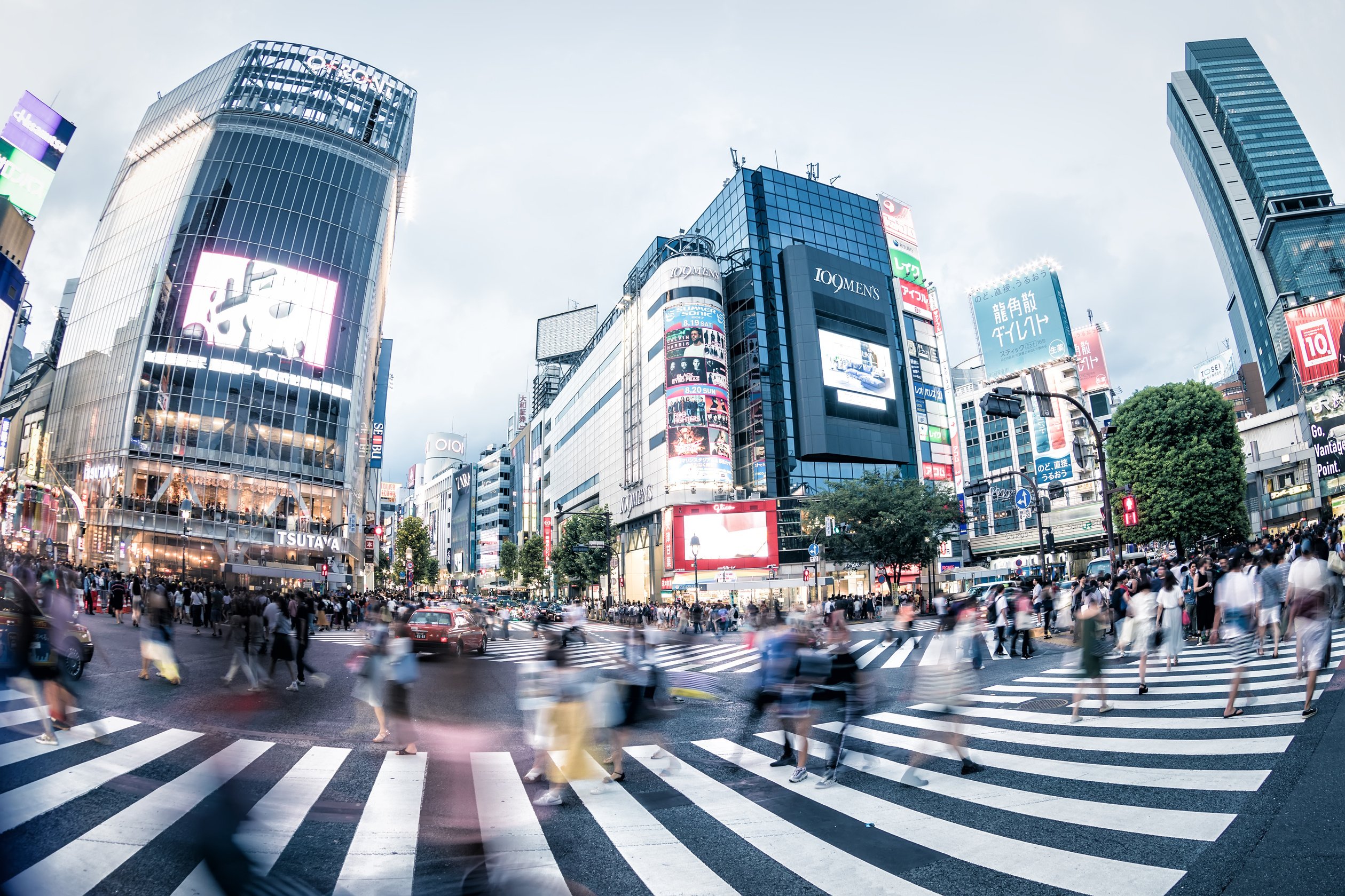 Shibuya Crossing in front of Shibuya Station.